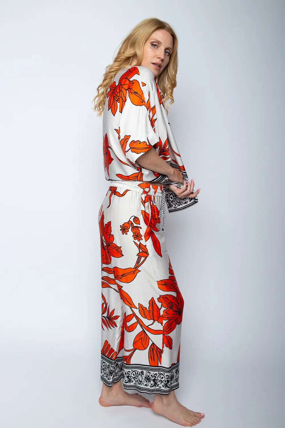 Emily Van Den Bergh Hose Orange Black Flower
