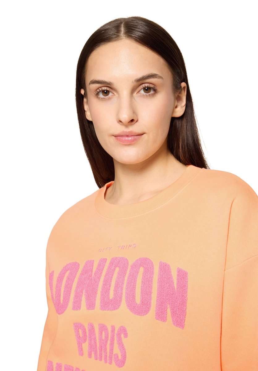 Cartoon Swaetshirt in der Farbe pink/orange